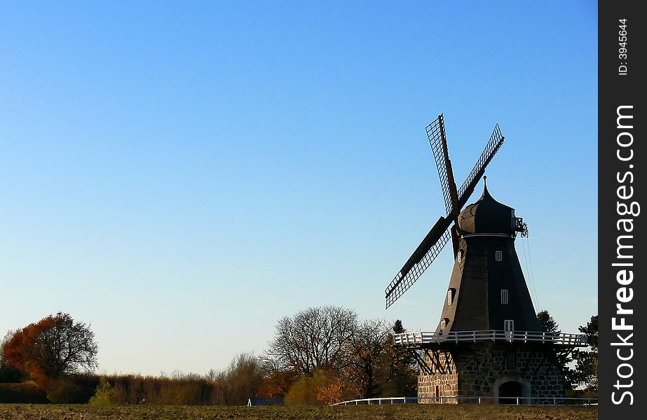 An old windmill in good condition at Romele峥n Southern Sweden. An old windmill in good condition at Romele峥n Southern Sweden