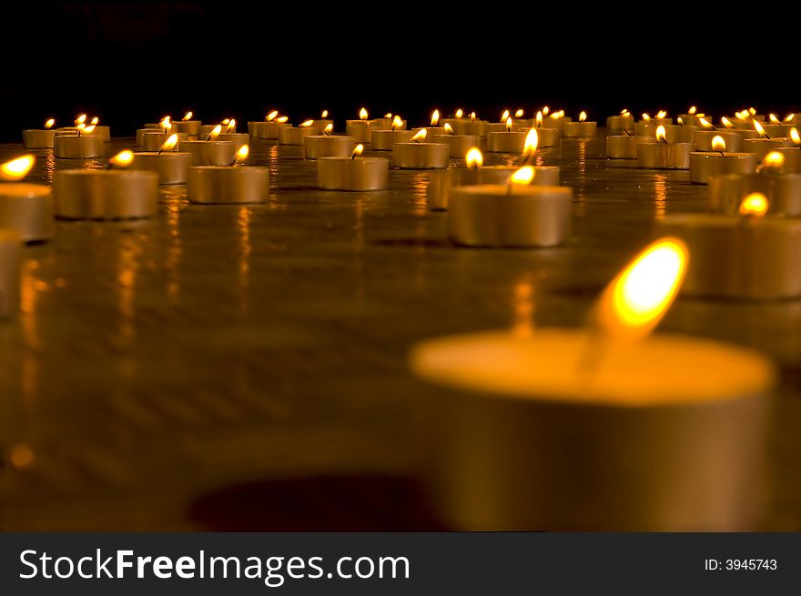 Close up view of the candles in the darkness