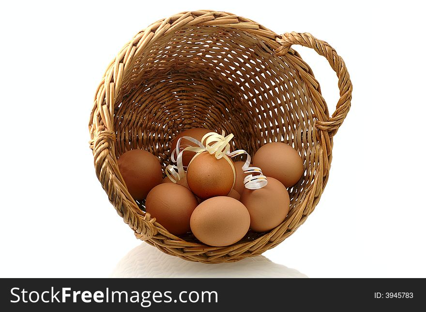 Few eggs in basket with one decorated