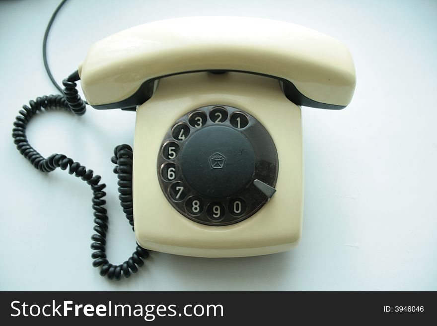 Ancient phone on a white background. Ancient phone on a white background