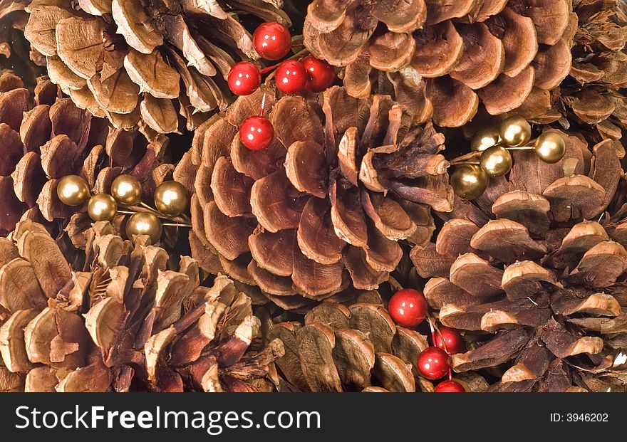 Background image of pine cones with red berries. Background image of pine cones with red berries