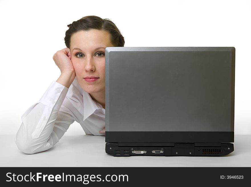Portrait of caucasian woman hiding behind her laptop. Portrait of caucasian woman hiding behind her laptop