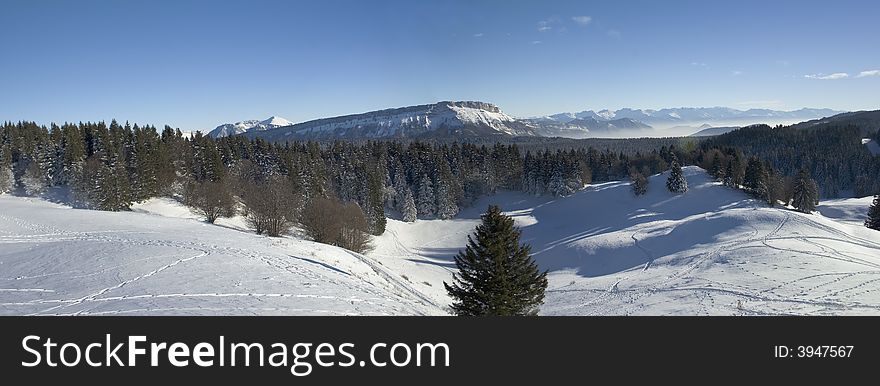 Landscape of mountain snow-covered with sun