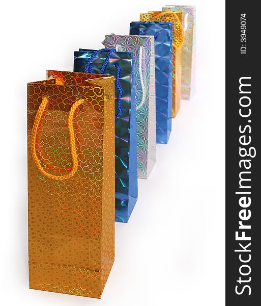 Yellow, silver and dark-blue shopping gift bags