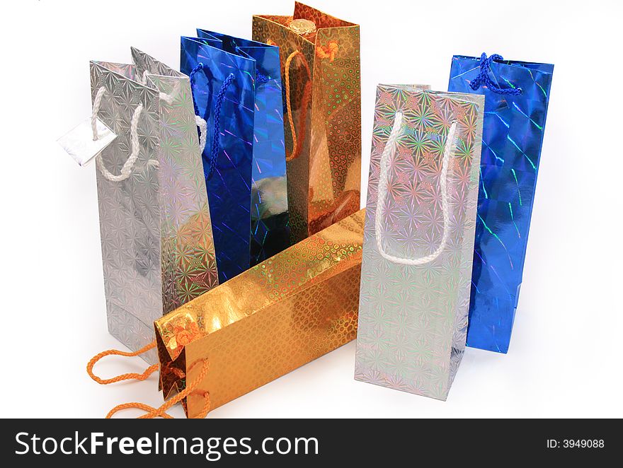 Yellow, silver and dark-blue shopping gift bags