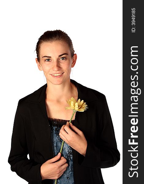 Young business woman with yelloe flower in hand. Young business woman with yelloe flower in hand