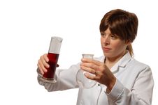 Young Lady Scientist Pours Liquid Royalty Free Stock Image Young Lady Scientist Pours Liquid Royalty Free Stock Image