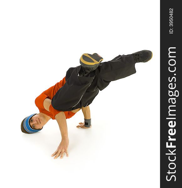 Young bboy holding up on hands and head. Holding legs in air. Looking at camera. Isolated on white in studio. Front view, whole body. Young bboy holding up on hands and head. Holding legs in air. Looking at camera. Isolated on white in studio. Front view, whole body