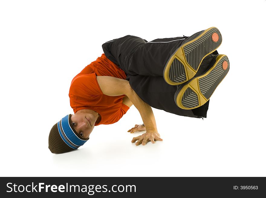 Young bboy holding up on hands and head. Holding legs in air. Looking at camera. Isolated on white in studio. Front view, whole body. Young bboy holding up on hands and head. Holding legs in air. Looking at camera. Isolated on white in studio. Front view, whole body