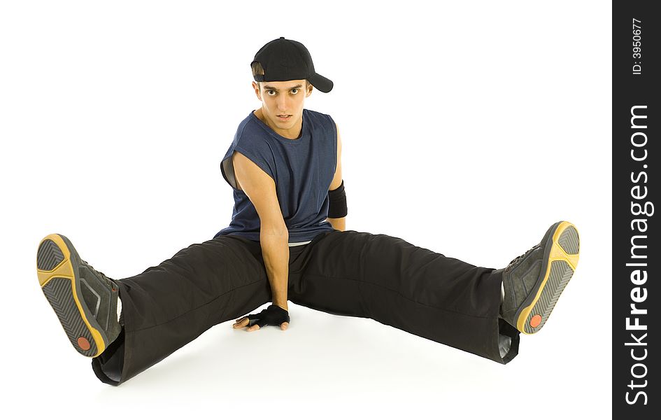 Young bboy holding up on hands. Holding legs in air. Looking at camera. Isolated on white in studio. Front view, whole body. Young bboy holding up on hands. Holding legs in air. Looking at camera. Isolated on white in studio. Front view, whole body