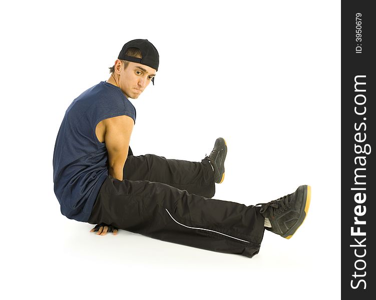 Young bboy holding up on hands and head. Holding legs in air. Isolated on white in studio. Side view, whole body. Young bboy holding up on hands and head. Holding legs in air. Isolated on white in studio. Side view, whole body