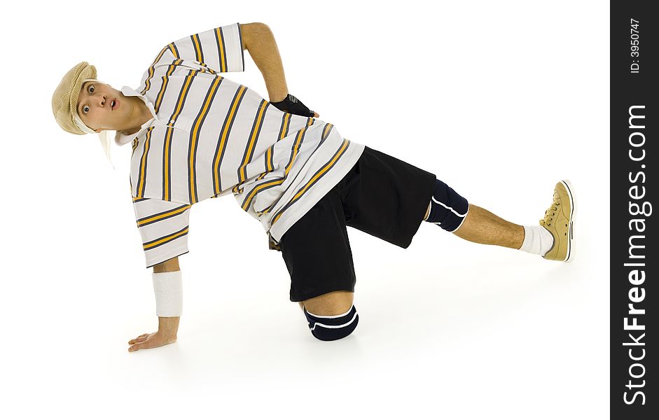 Young bboy holding up on hand and kneeling on one knee. Looking surprised at camera. Isolated on white in studio. Front view, whole body. Young bboy holding up on hand and kneeling on one knee. Looking surprised at camera. Isolated on white in studio. Front view, whole body