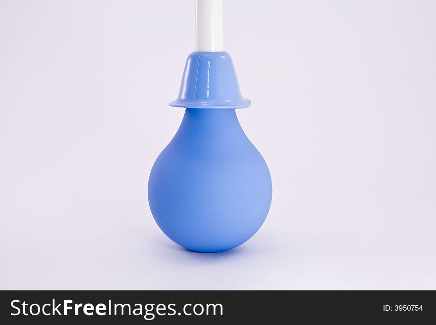 Rubber pear with a tip on white background