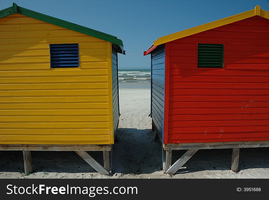 Famous changing huts for bathers on the beach at Muizenberg. Famous changing huts for bathers on the beach at Muizenberg.