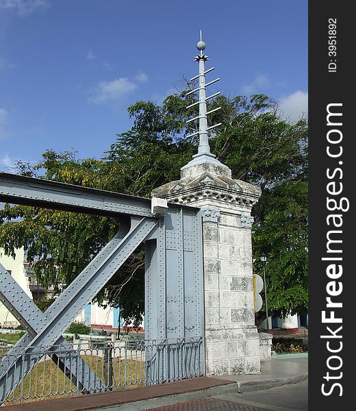 Column at one side of a road bridge over a river in Matanzas, date from 1899