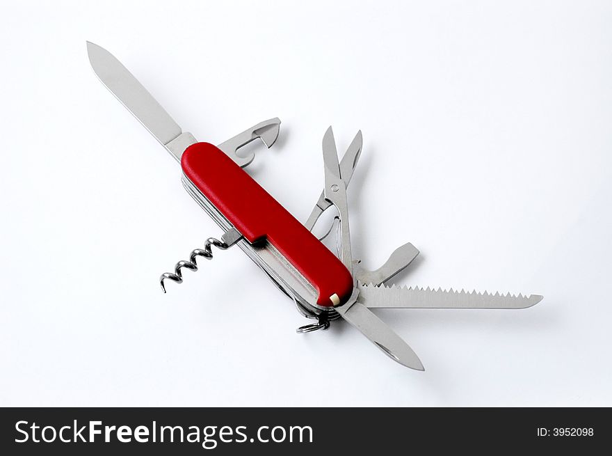 A Swiss army style knife isolated on White. A Swiss army style knife isolated on White