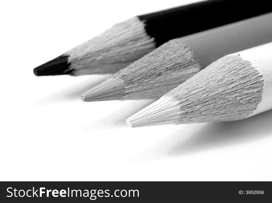 Black, white and gray colored pencils. Black, white and gray colored pencils