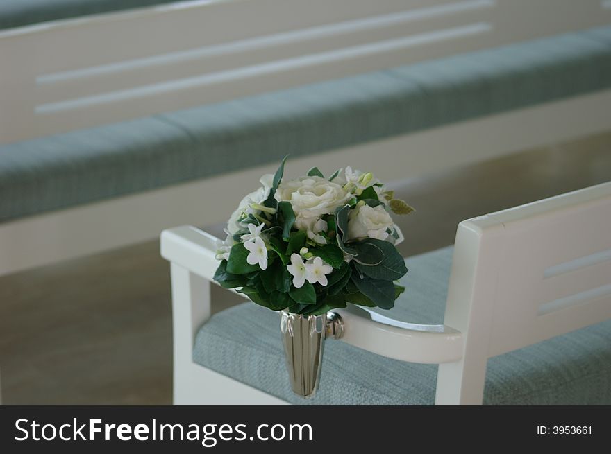 Empty rows of seats in a wedding chapel