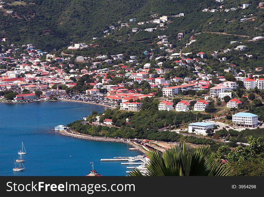 Tropical houses on hill overlooking harbor. St Thomas US Virgin Islands