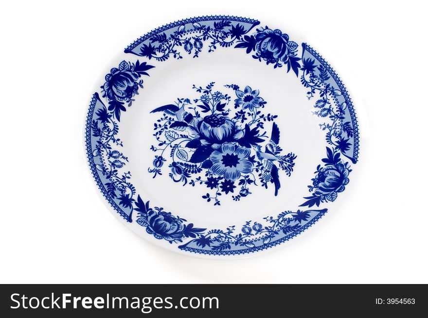 Ceramic plate decorated with blue patterns