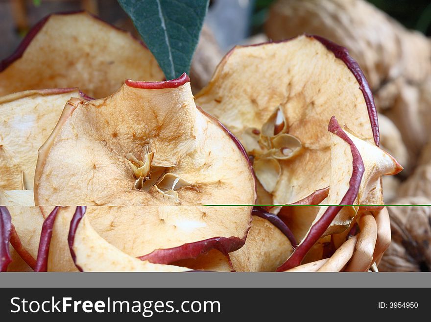 Close up of dried apples and walnuts