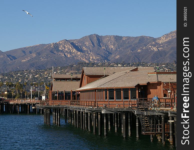 A building, used as a restaurant located on the local pier. A building, used as a restaurant located on the local pier.