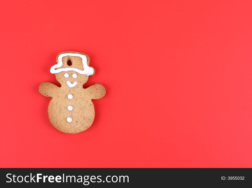 Gingerbread cokkie - snowman- on red. Gingerbread cokkie - snowman- on red