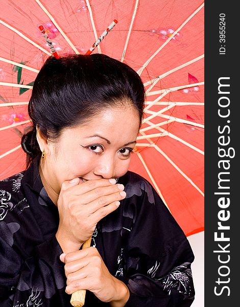 Japanese beauty women smiling and covers her mouth.