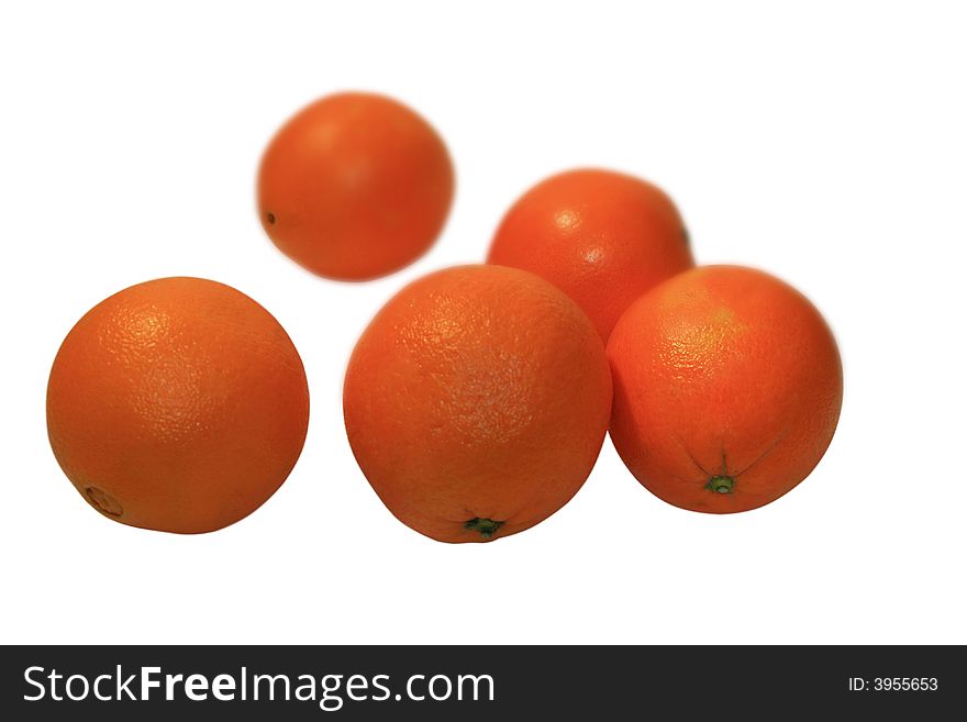 Five juicy oranges isolated on a white background