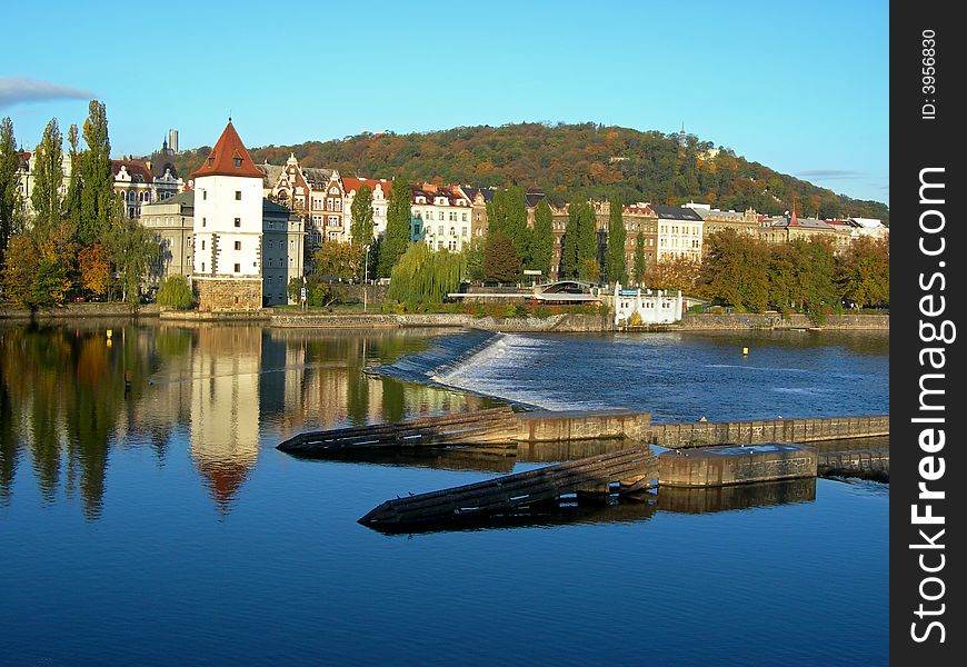 Panoramatic photo of the city of Prague with a view at Vltava River
