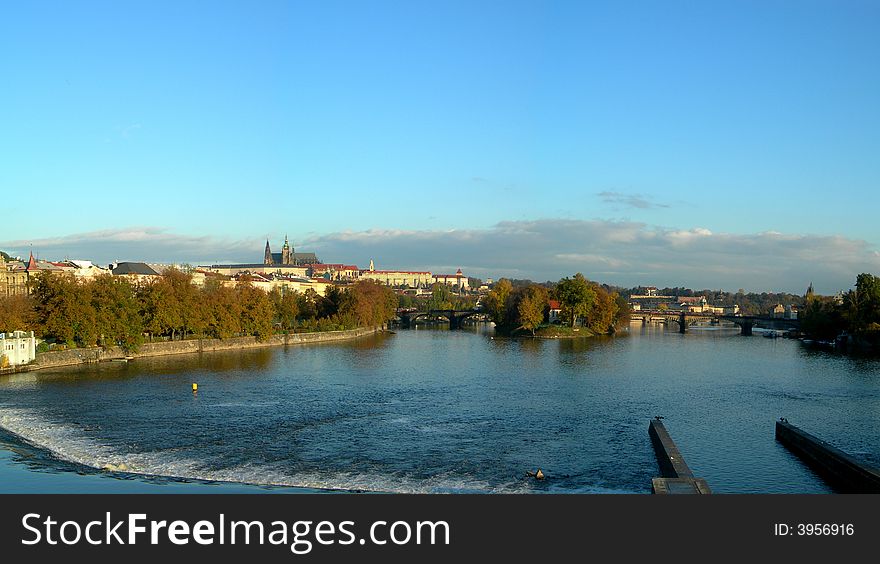 Panoramatic photo of the city of Prague with a view at Vltava River and Castle. Panoramatic photo of the city of Prague with a view at Vltava River and Castle