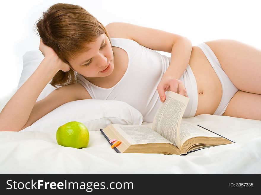 Woman on bed read the book