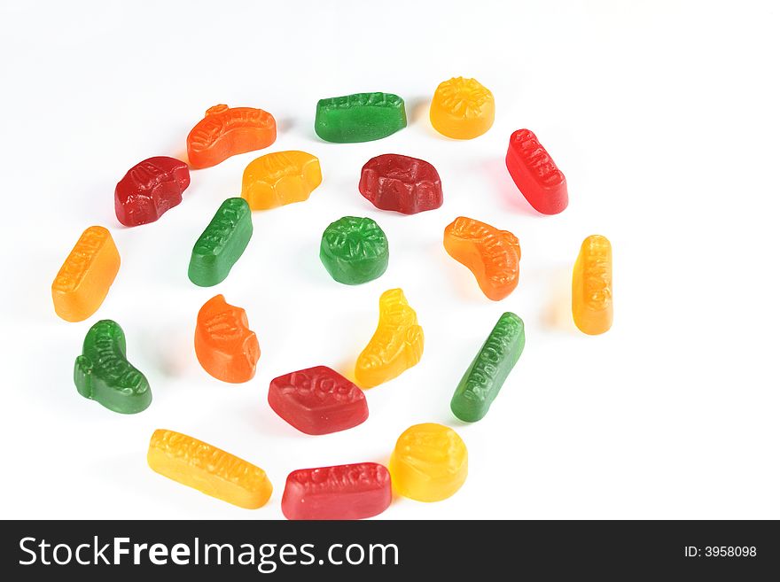 Coloured candy sweets isolated over a white background