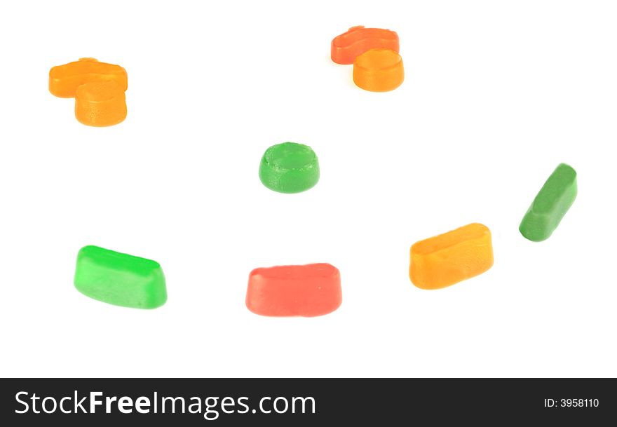 Coloured candy sweets isolated over a white background. Coloured candy sweets isolated over a white background