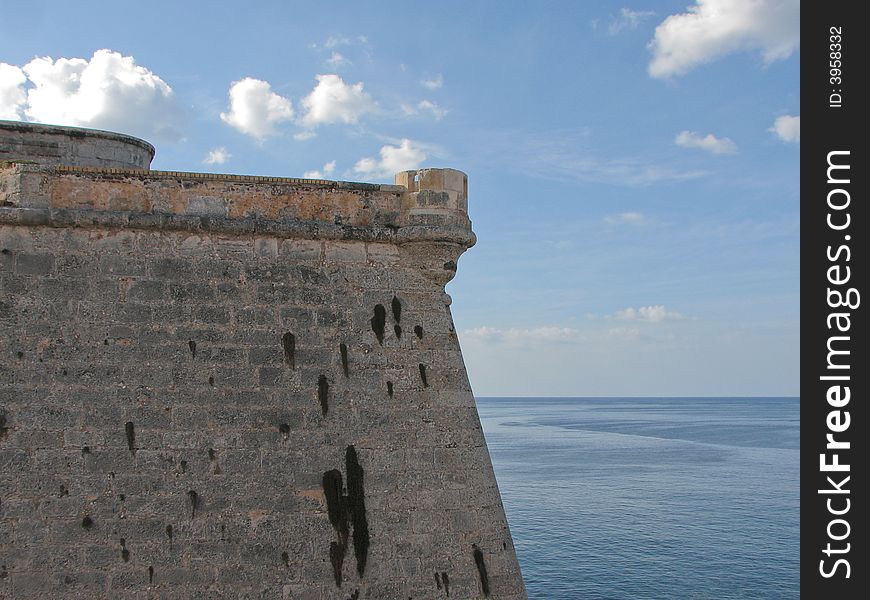 Old castle with a sea and sky background. Old castle with a sea and sky background