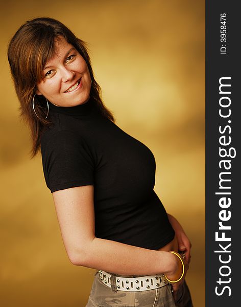 An attractive woman over brown background. An attractive woman over brown background