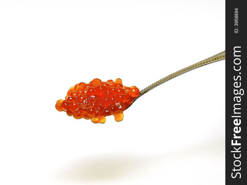 Fresh red caviar on the spoon