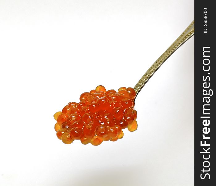 Fresh red caviar on the spoon