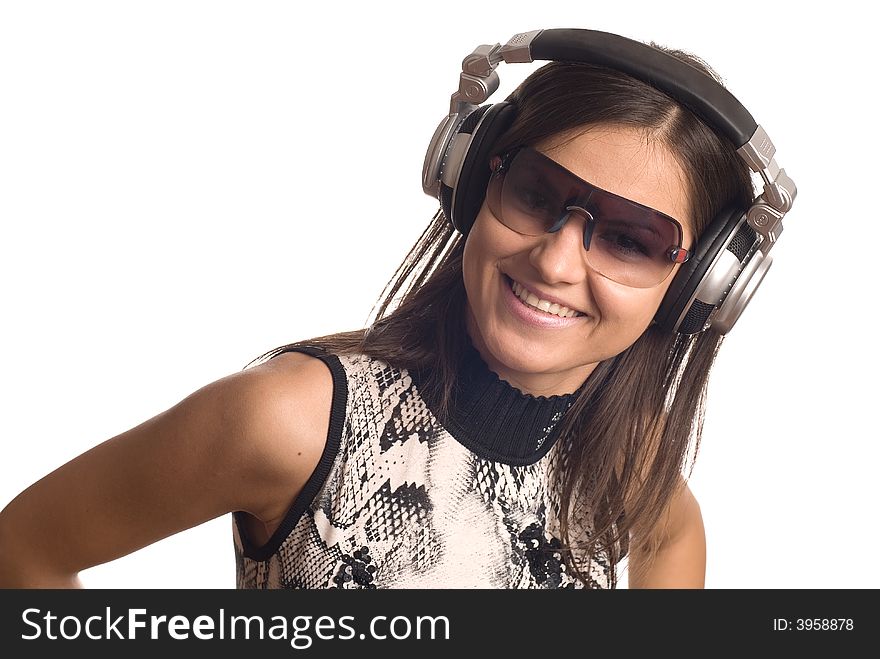 The beautiful girl with headphones on a white background. The beautiful girl with headphones on a white background