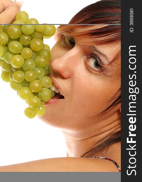 Beautiful girl with green grape