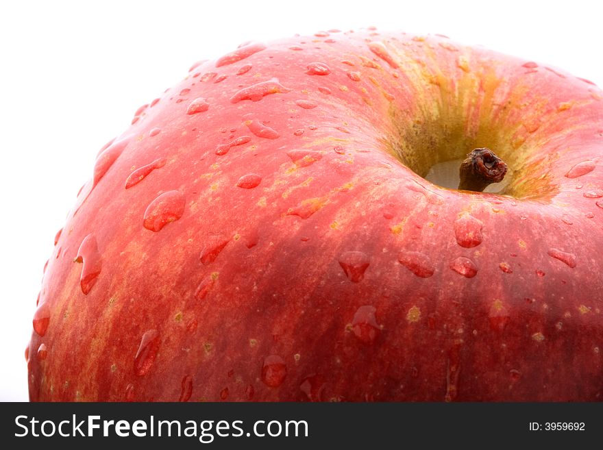 Macro red apple, with drops of water