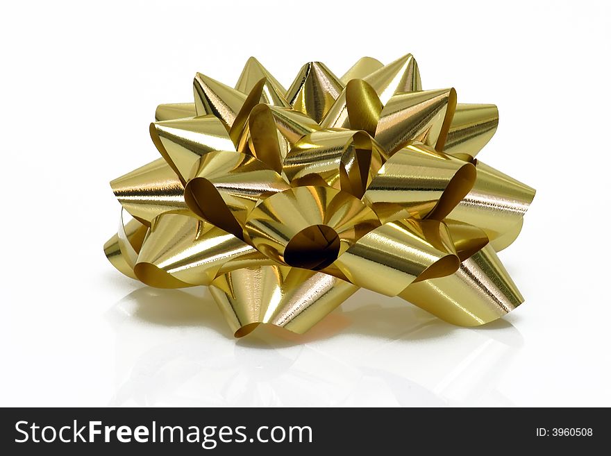 Golden Gift Bow on bright background