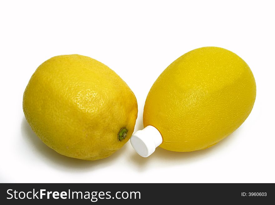 A Bottle Lemon concentrate on bright background