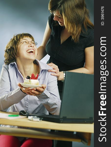 Smiling colleagues in an office. Smiling colleagues in an office