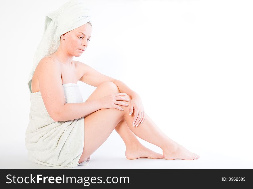 Studio portrait of a spa girl sitting. Studio portrait of a spa girl sitting