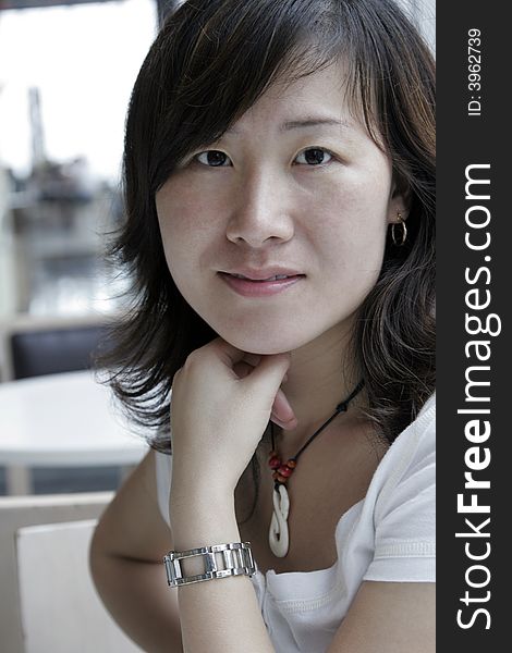 Young Beautiful Asian Woman, Long Black Hair, Window Light. Young Beautiful Asian Woman, Long Black Hair, Window Light