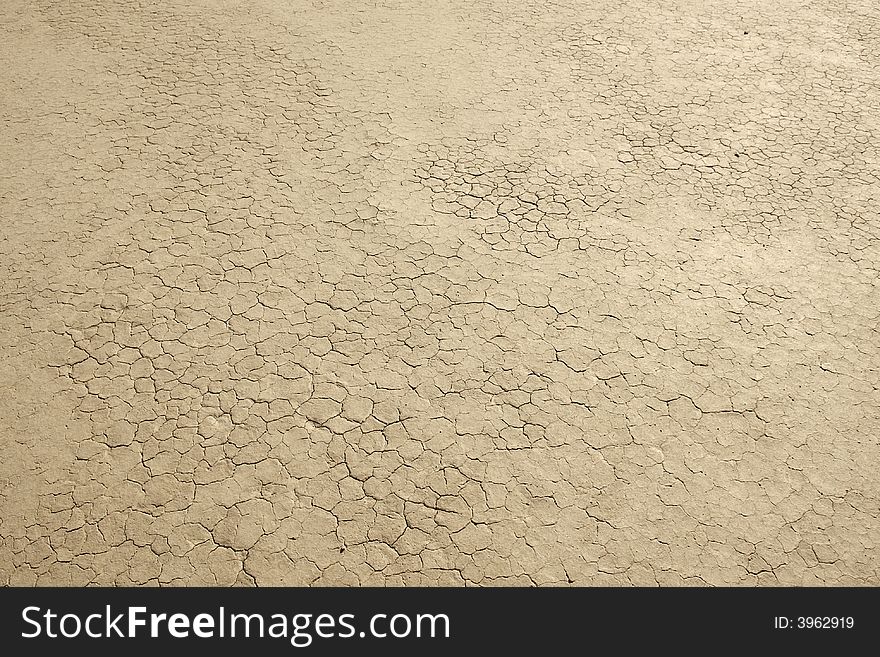 Cracked dry flat land. Death Valley, the United States. Cracked dry flat land. Death Valley, the United States