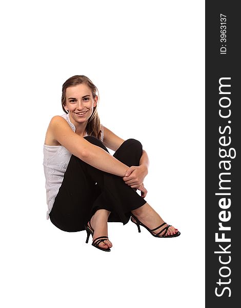 Model sitting on the ground with legs crosses. Model sitting on the ground with legs crosses