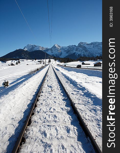 Railroad track at the alps in winter