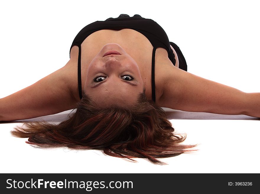 Model lying on her back looking at photographer